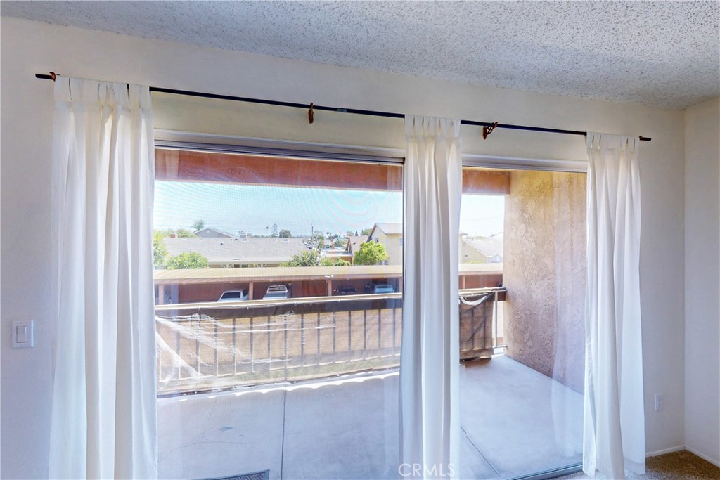 6600 Warner Avenue, Unit 88 Huntington Beach, CA 92647 - Photo 9 of 25 a view of a room with a large window