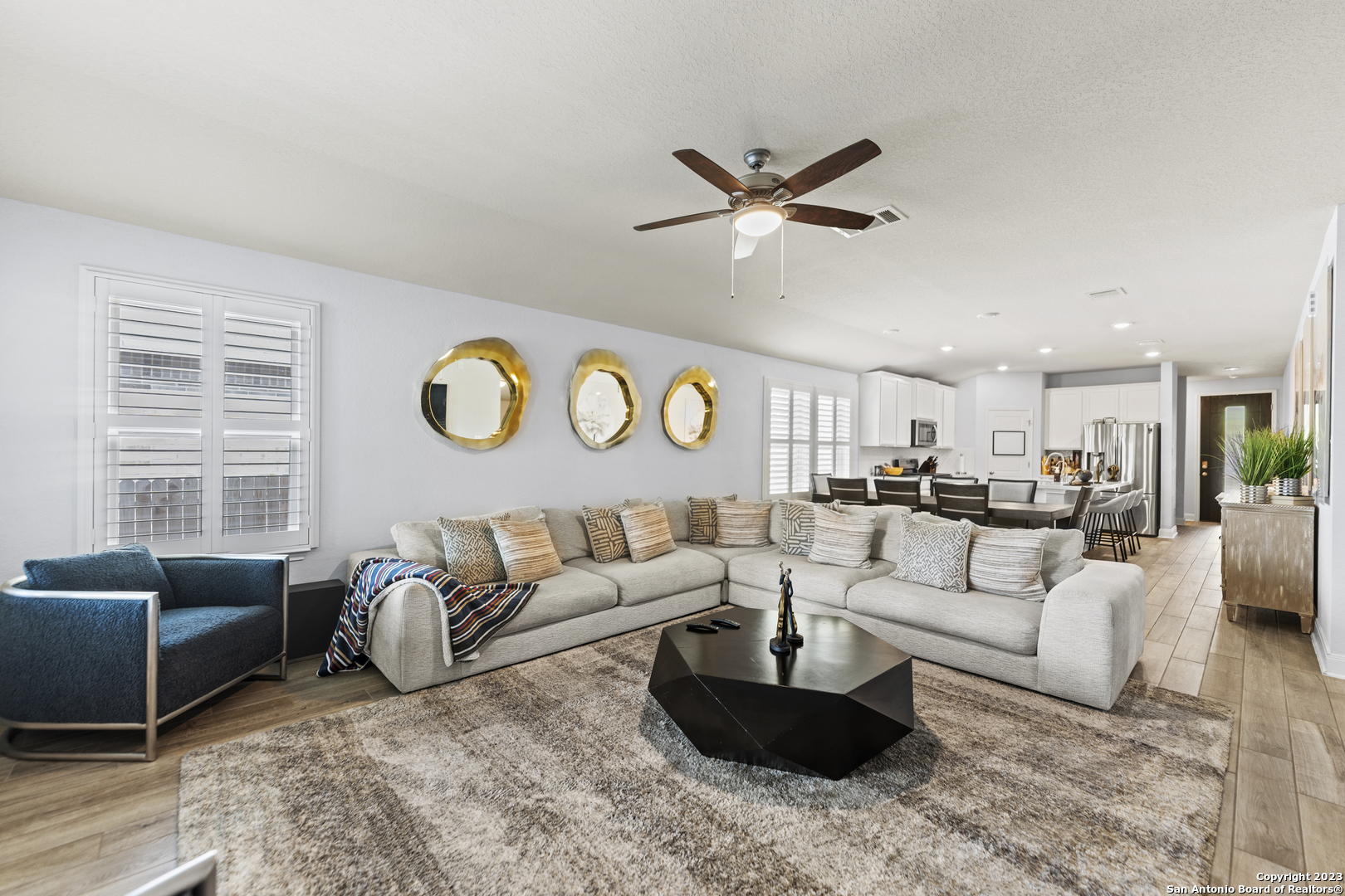 12136 Icon Ridge San Antonio, TX 78253 - Photo 12 of 26 a living room with furniture and a large window