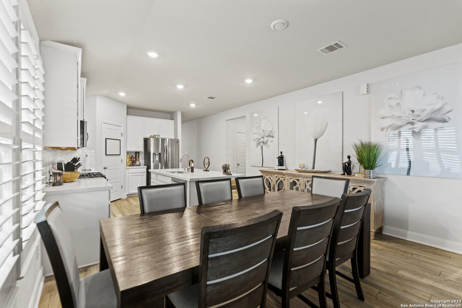 12136 Icon Ridge San Antonio, TX 78253 - Photo 8 of 26 a view of a dining room with furniture