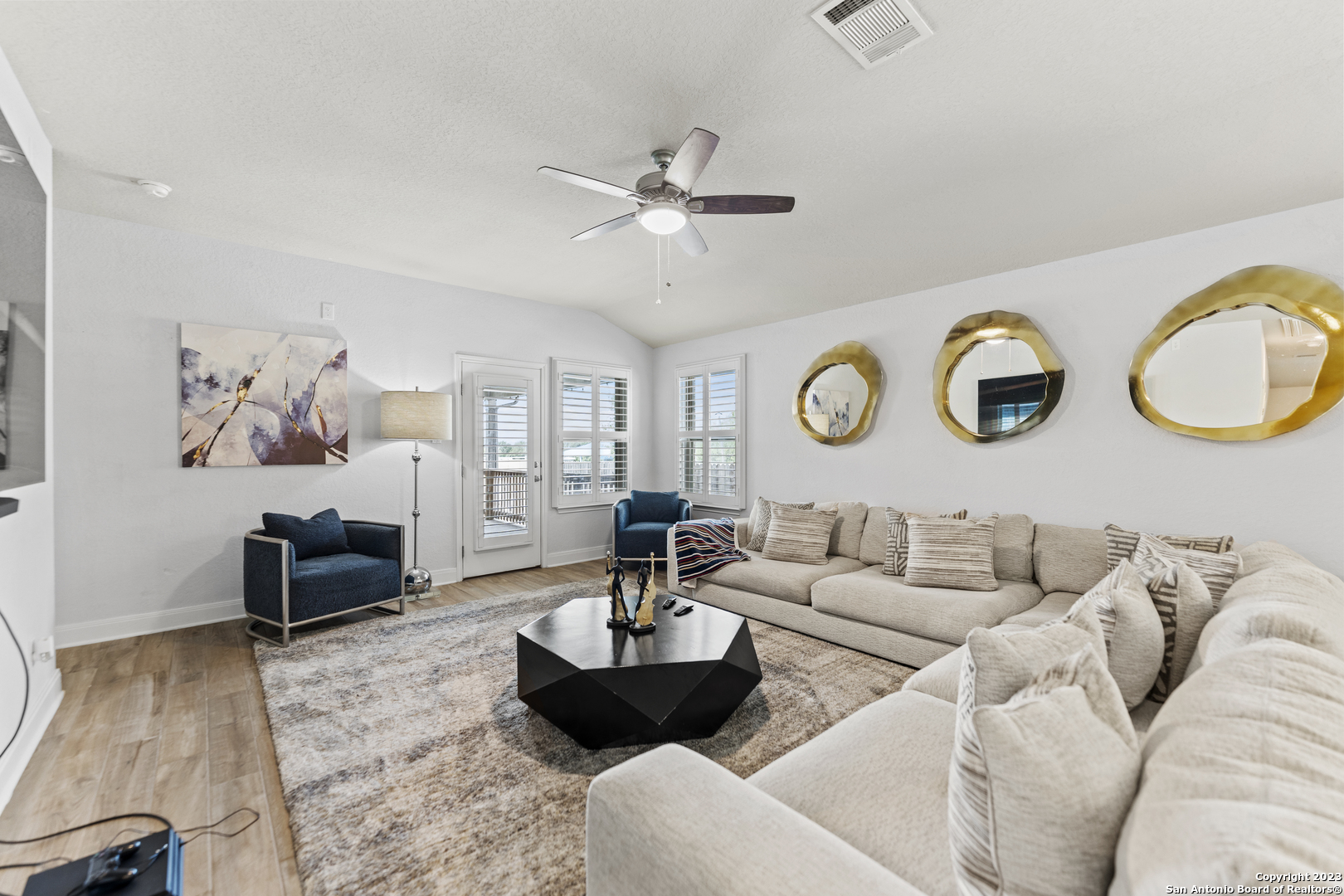 12136 Icon Ridge San Antonio, TX 78253 - Photo 10 of 26 a living room with furniture and a rug