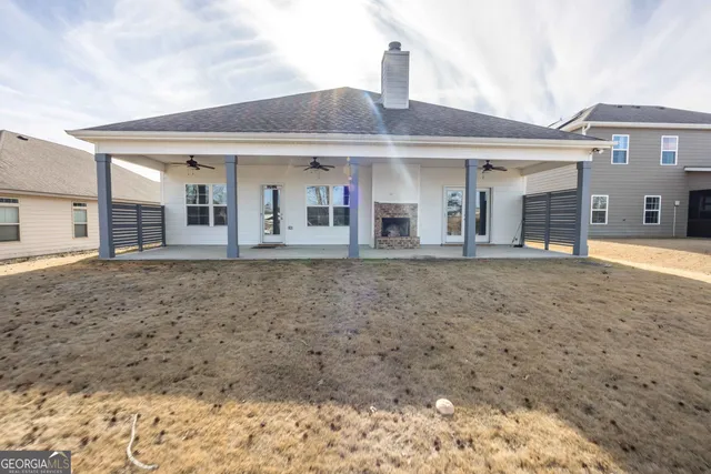 a front view of a house with a porch