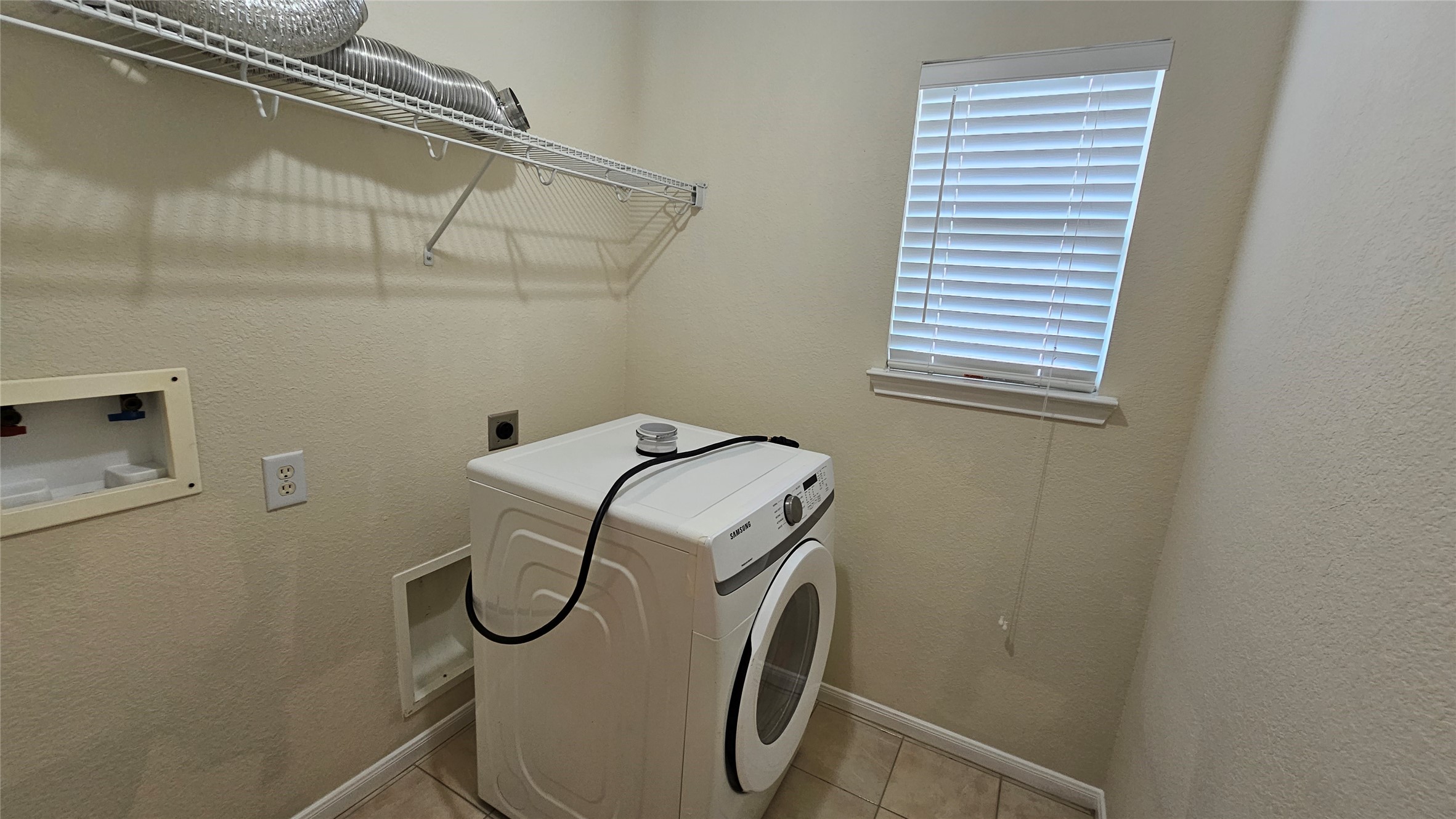 7918 Barnes Ridge Lane Houston, TX 77072 - Photo 29 of 34 This is a laundry room