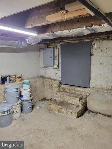 a kitchen with a stove and cabinets