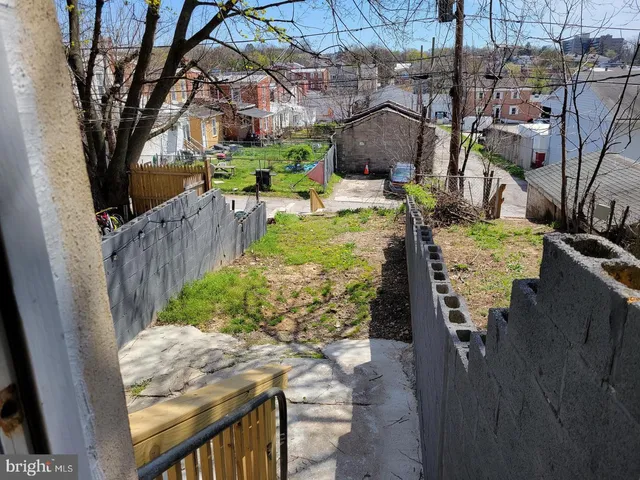 a car parked in front of a house