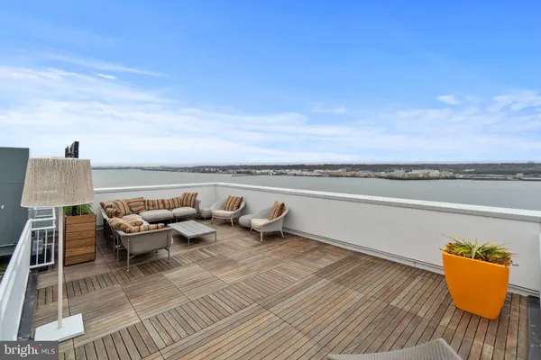 swimming pool with outdoor seating