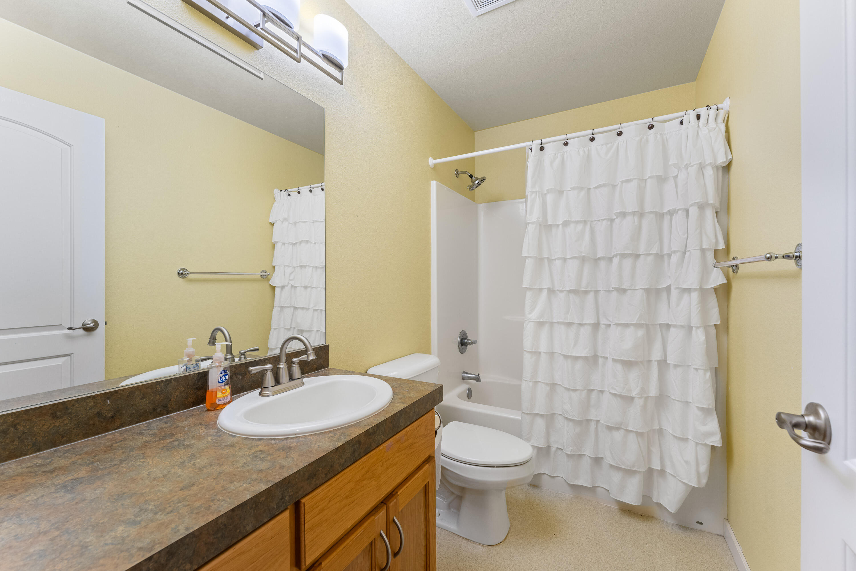 105 Cedar Ridge Terrace Rogue River, OR 97537 - Photo 15 of 23 a bathroom with a granite countertop sink toilet and shower