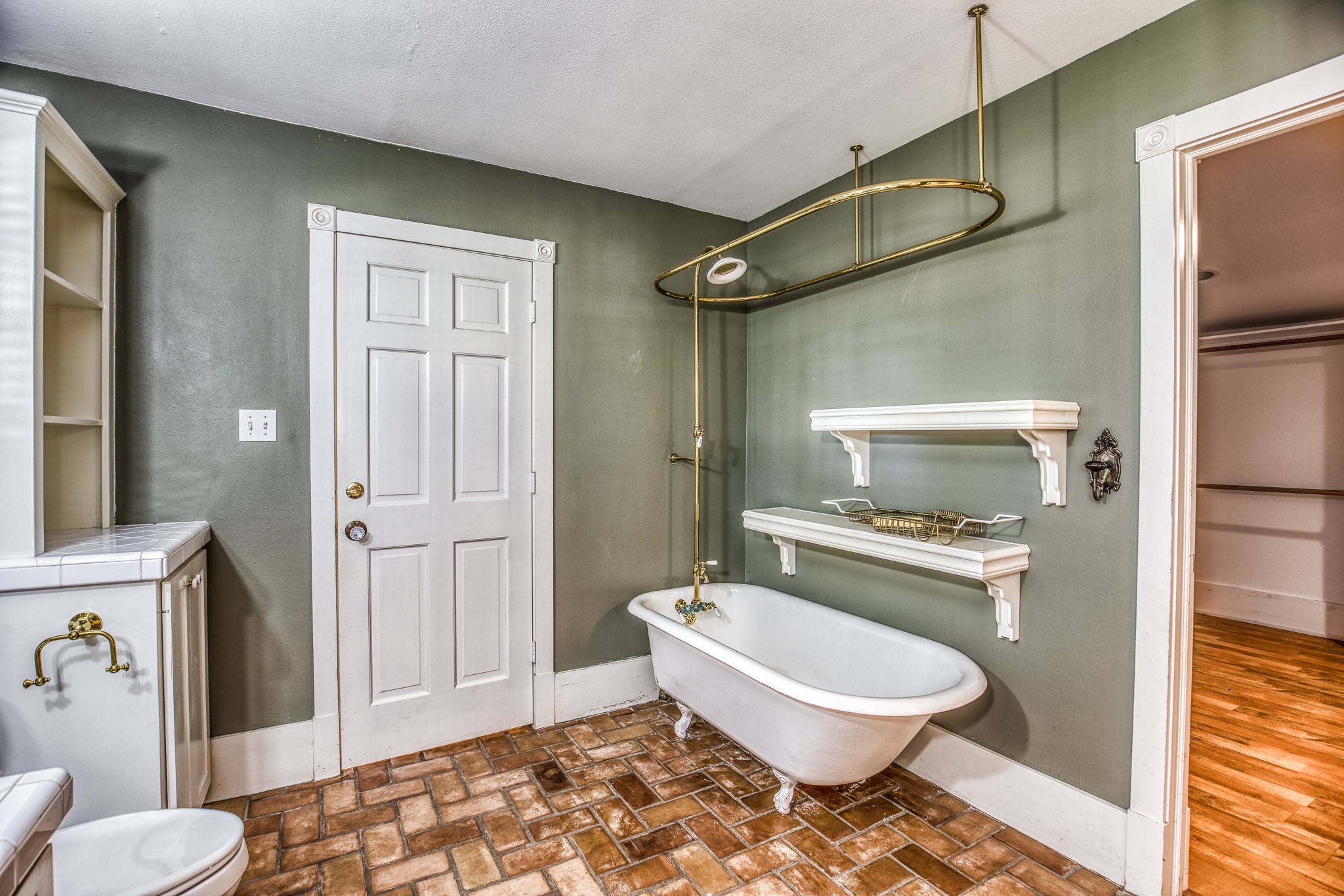 1712 Lynn Road Chappell Hill, TX 77426 - Photo 17 of 44 a bathroom with a toilet a sink and a mirror