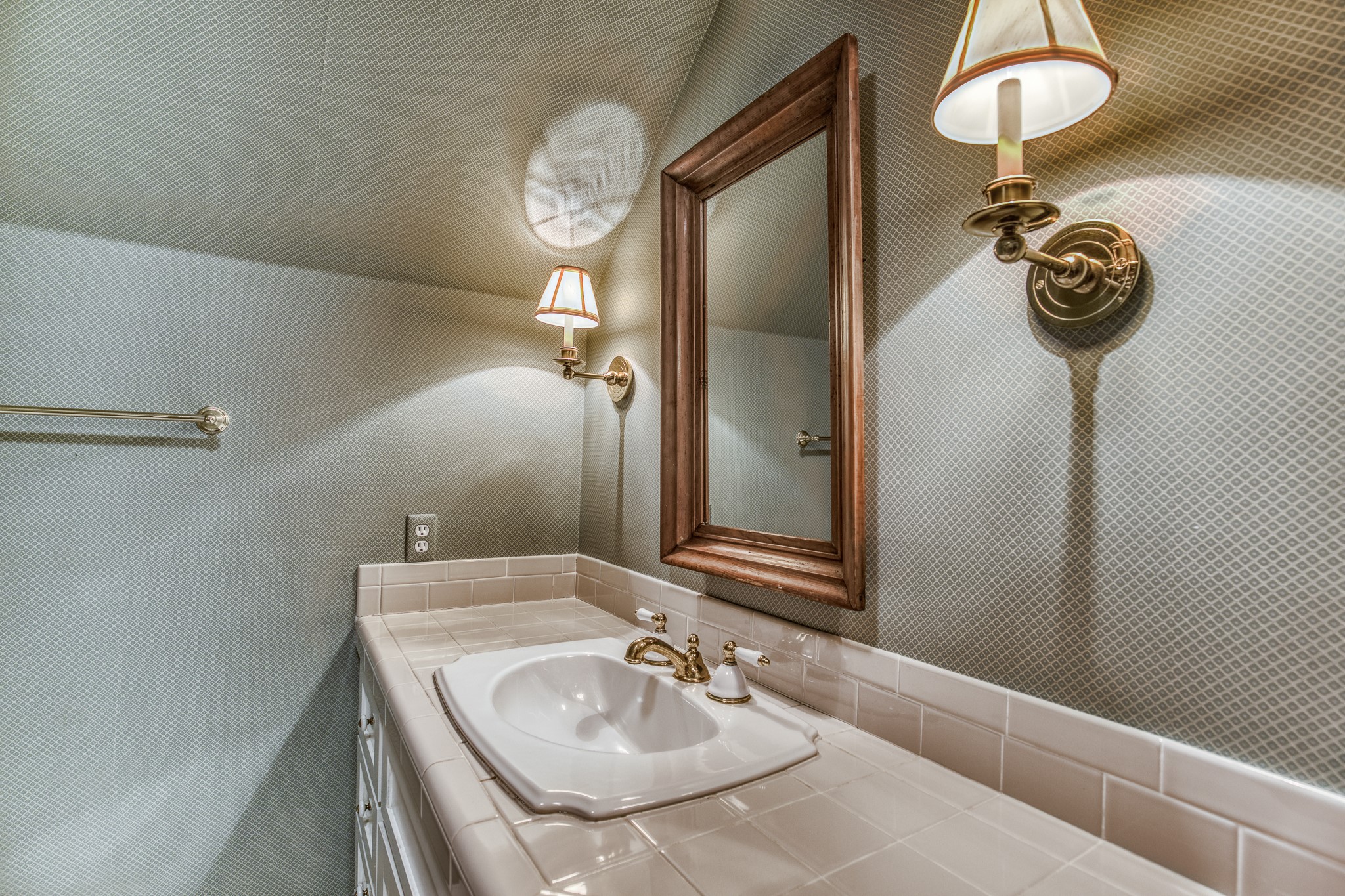 1712 Lynn Road Chappell Hill, TX 77426 - Photo 20 of 44 a bathroom with a sink and a mirror