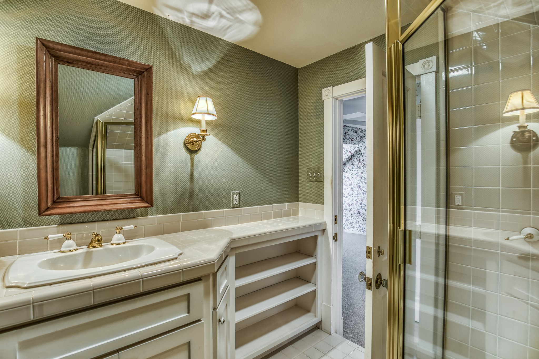 1712 Lynn Road Chappell Hill, TX 77426 - Photo 21 of 44 a bathroom with a sink and a mirror