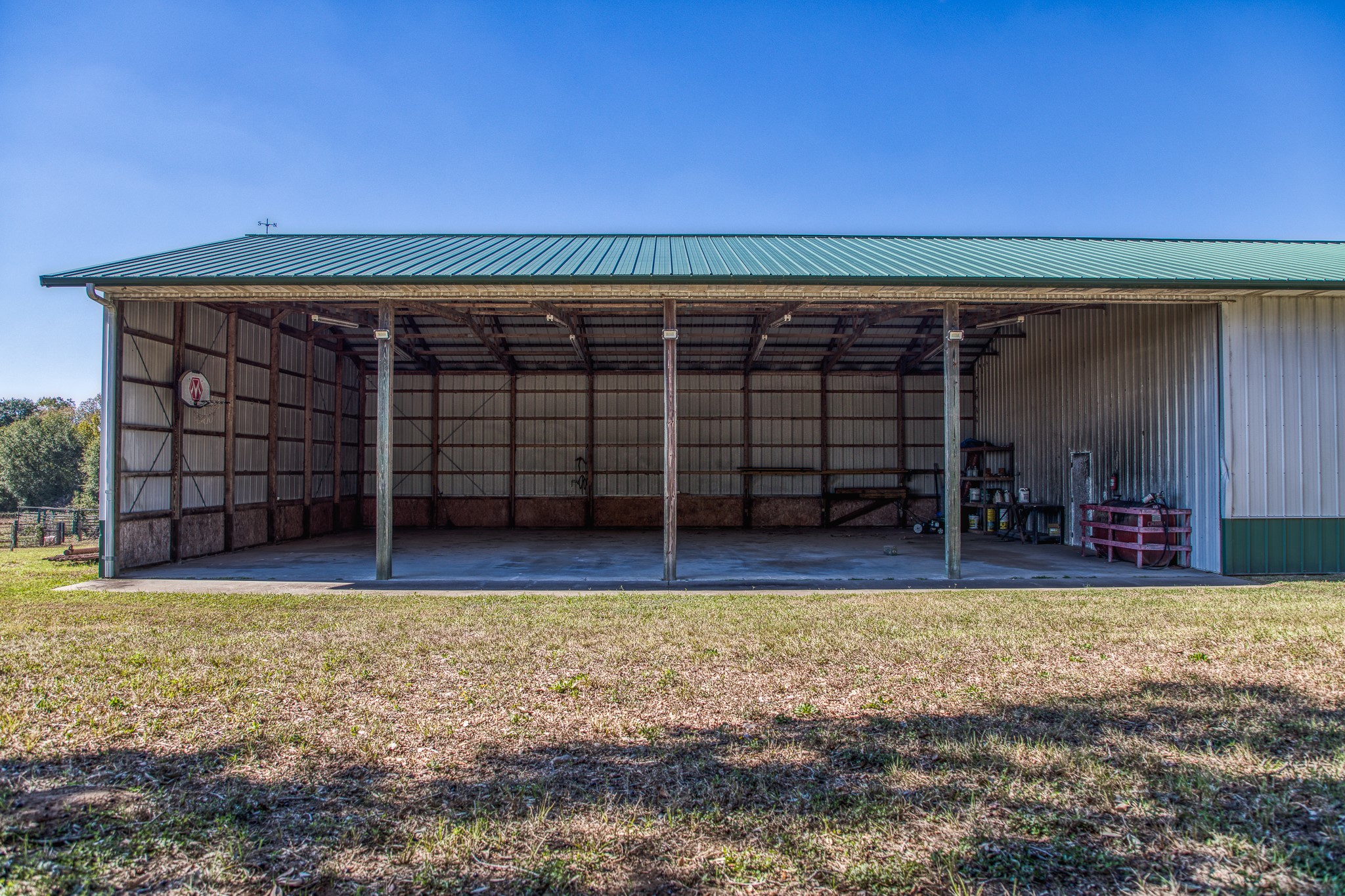 1712 Lynn Road Chappell Hill, TX 77426 - Photo 30 of 44 a view of a house with a yard
