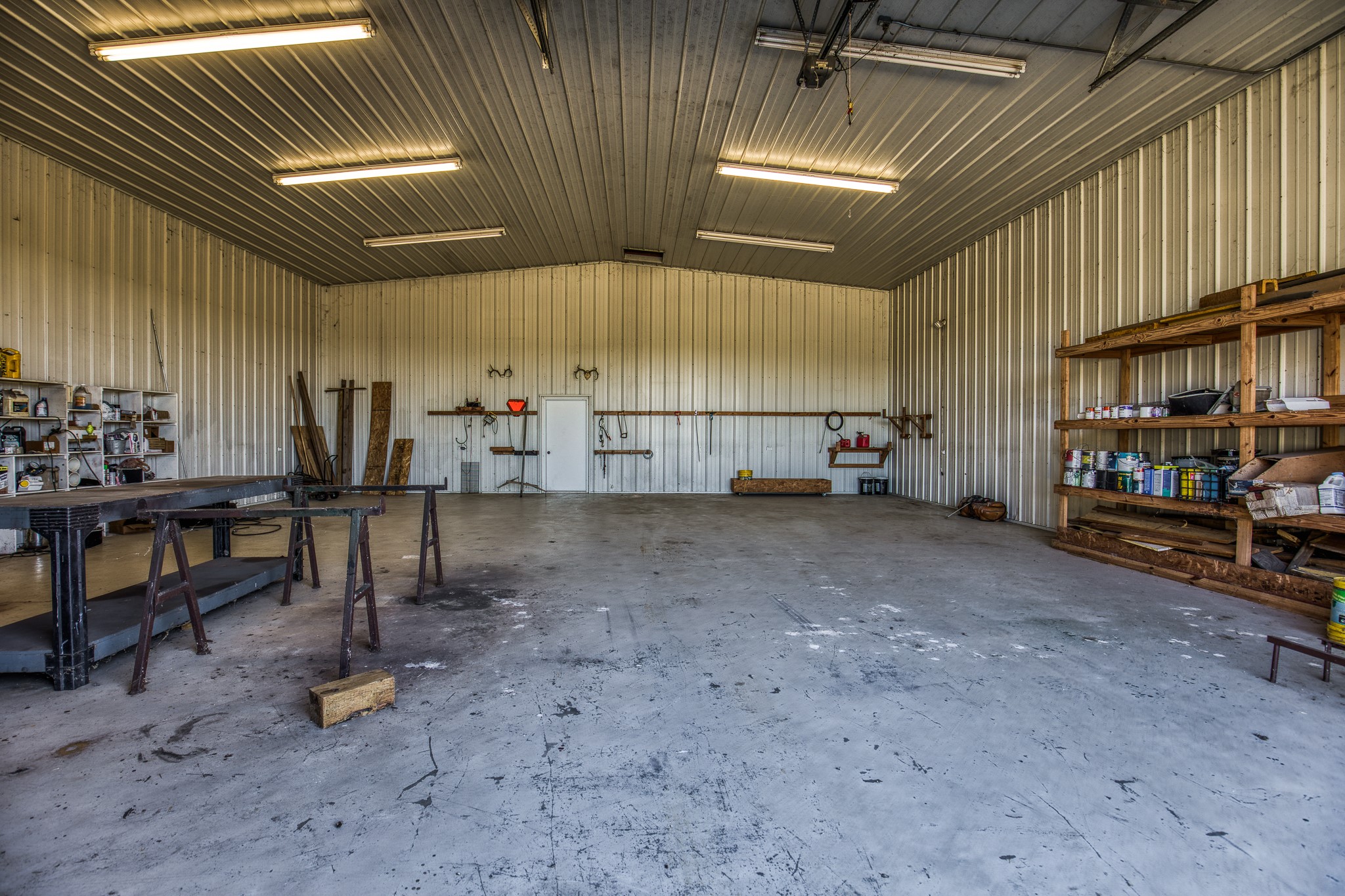 1712 Lynn Road Chappell Hill, TX 77426 - Photo 31 of 44 a view of a room with gym equipment