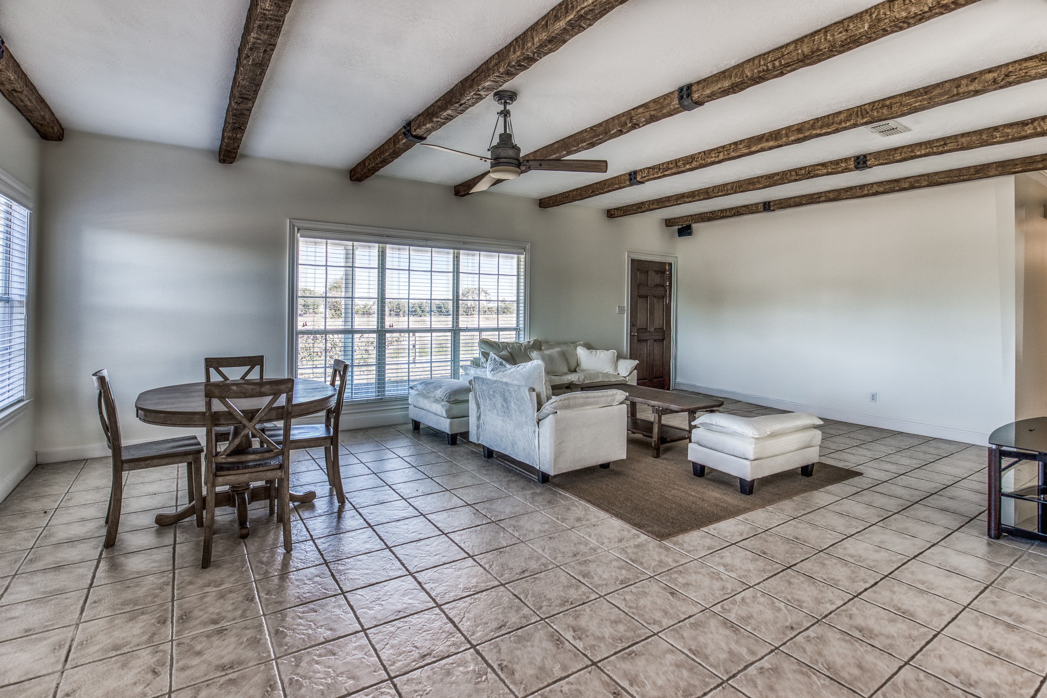 1712 Lynn Road Chappell Hill, TX 77426 - Photo 40 of 44 a living room with furniture and a window