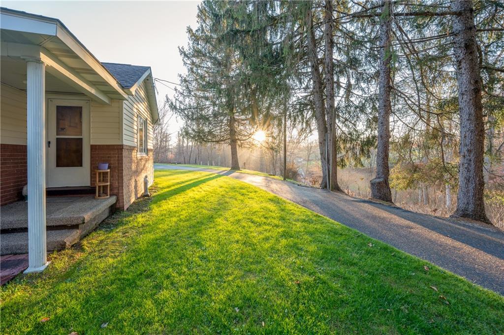 185 Foster Road Saltsburg, PA 15681 - Photo 36 of 42 a view of a backyard with large trees