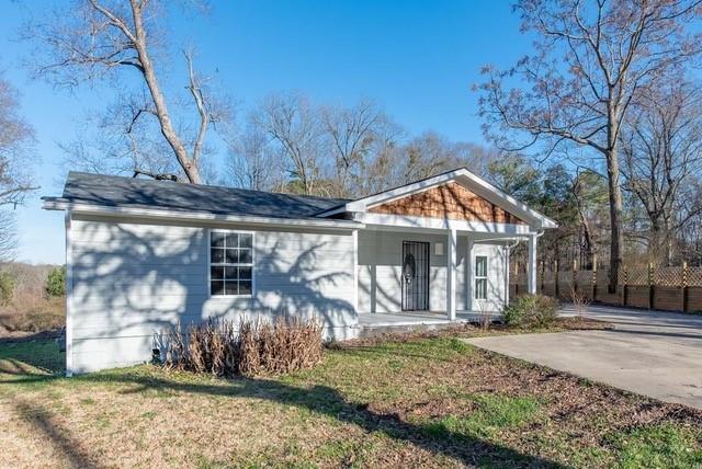 2164 Bouldercrest Road Atlanta, GA 30316 - Photo 3 of 11 a front view of a house with garden