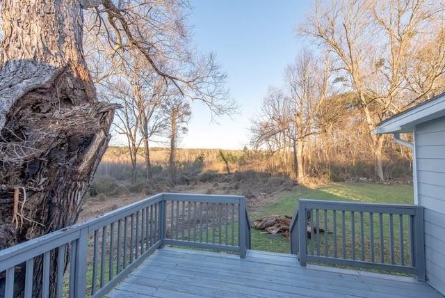 2164 Bouldercrest Road Atlanta, GA 30316 - Photo 8 of 11 a balcony with wooden floor and fence