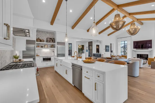 a view of a livingroom with furniture and a table