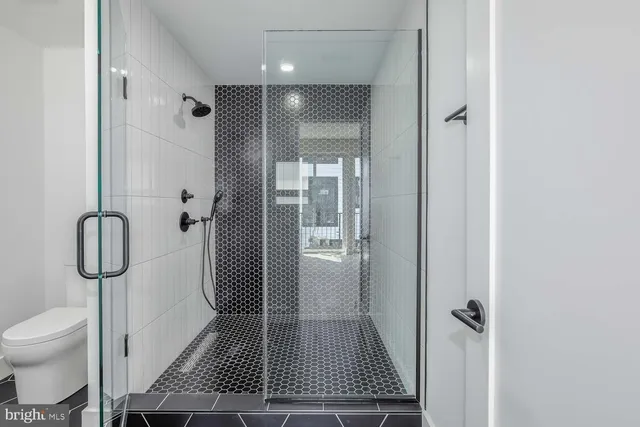 a bathroom with a sink and toilet