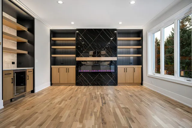a view of a kitchen with furniture and staircase