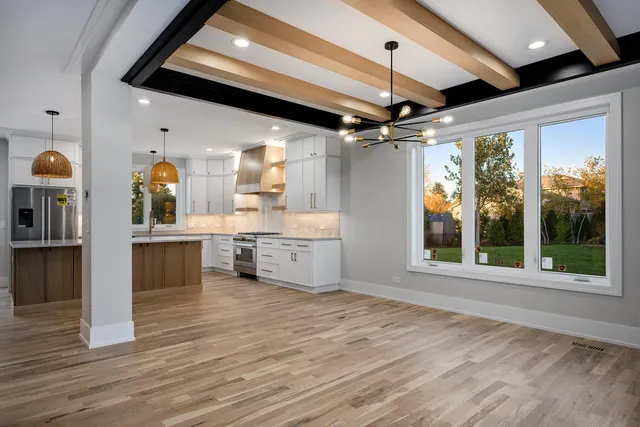 a view of a kitchen with a sink and cabinets