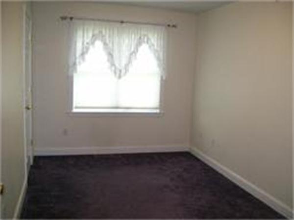 1 Village Way, Unit 1 Rutland, MA 01543 - Photo 8 of 16 an empty room with a window