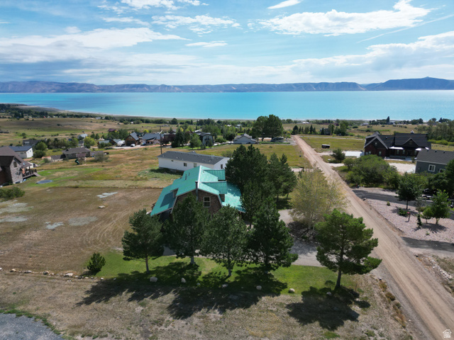 358 Maple Drive Fish Haven, ID 83287 - Photo 33 of 46 Property with a green-toned roof and solar panels