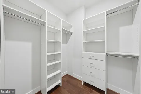 a view of an empty walk in closet