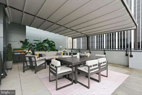 a outdoor living space with furniture