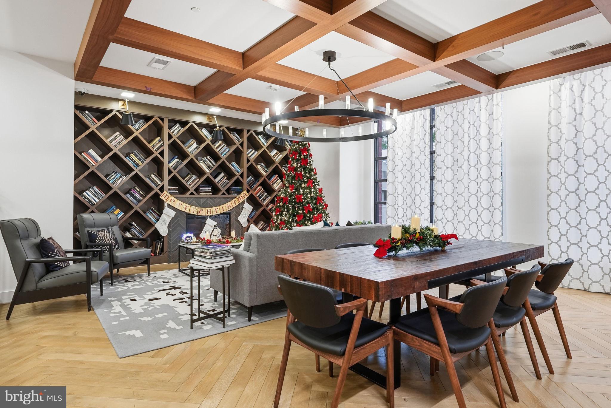 1411 Key Boulevard, Unit 505 Arlington, VA 22209 - Photo 25 of 26 a table and chairs in front of a glass door