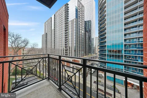 a view of balcony with a small yard