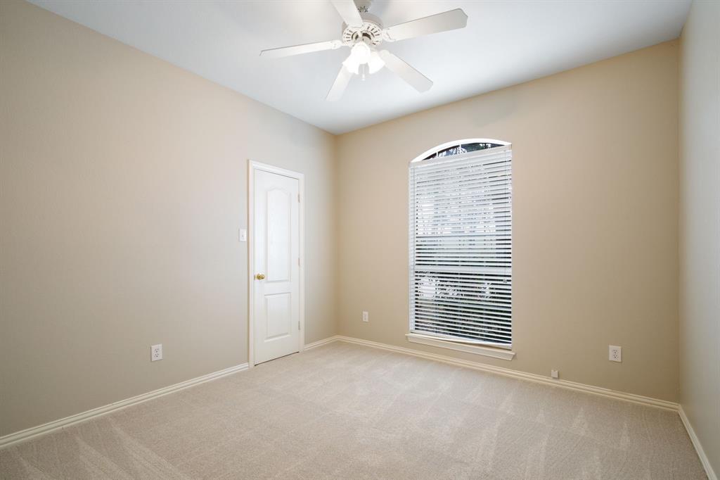 921 West Muirfield Road Garland, TX 75044 - Photo 25 of 33 a view of an empty room with a window
