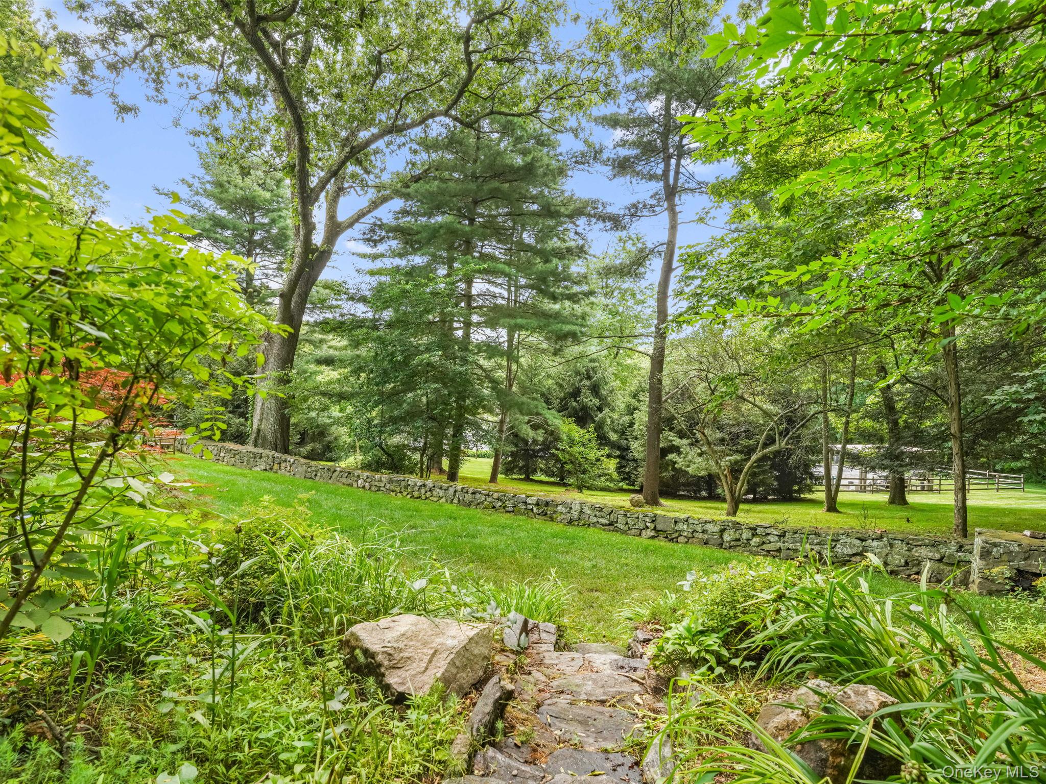 8 South Bedford Road Pound Ridge, NY 10576 - Photo 31 of 32 a view of a park with large trees