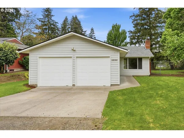 a view of outdoor space yard and garage