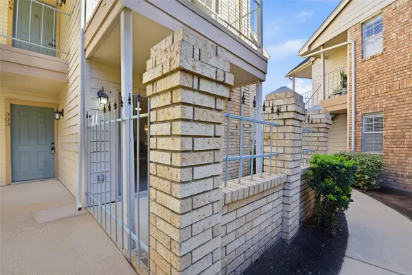 a view of front door of house with a street view