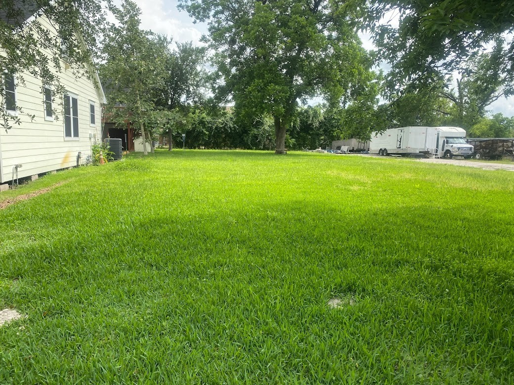 4918 Polk Street Houston, TX 77023 - Photo 2 of 3 a view of a house with a backyard