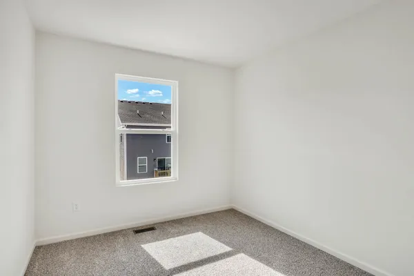 an empty room with a window