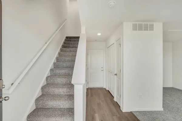 a view of entryway with stairs