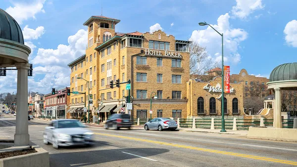 a front view of a building with street view
