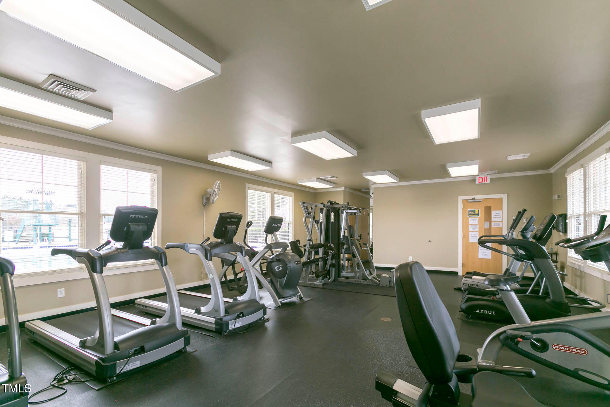 297 Colonial Ridge Drive Pittsboro, NC 27312 - Photo 19 of 28 a view of a room with gym equipment