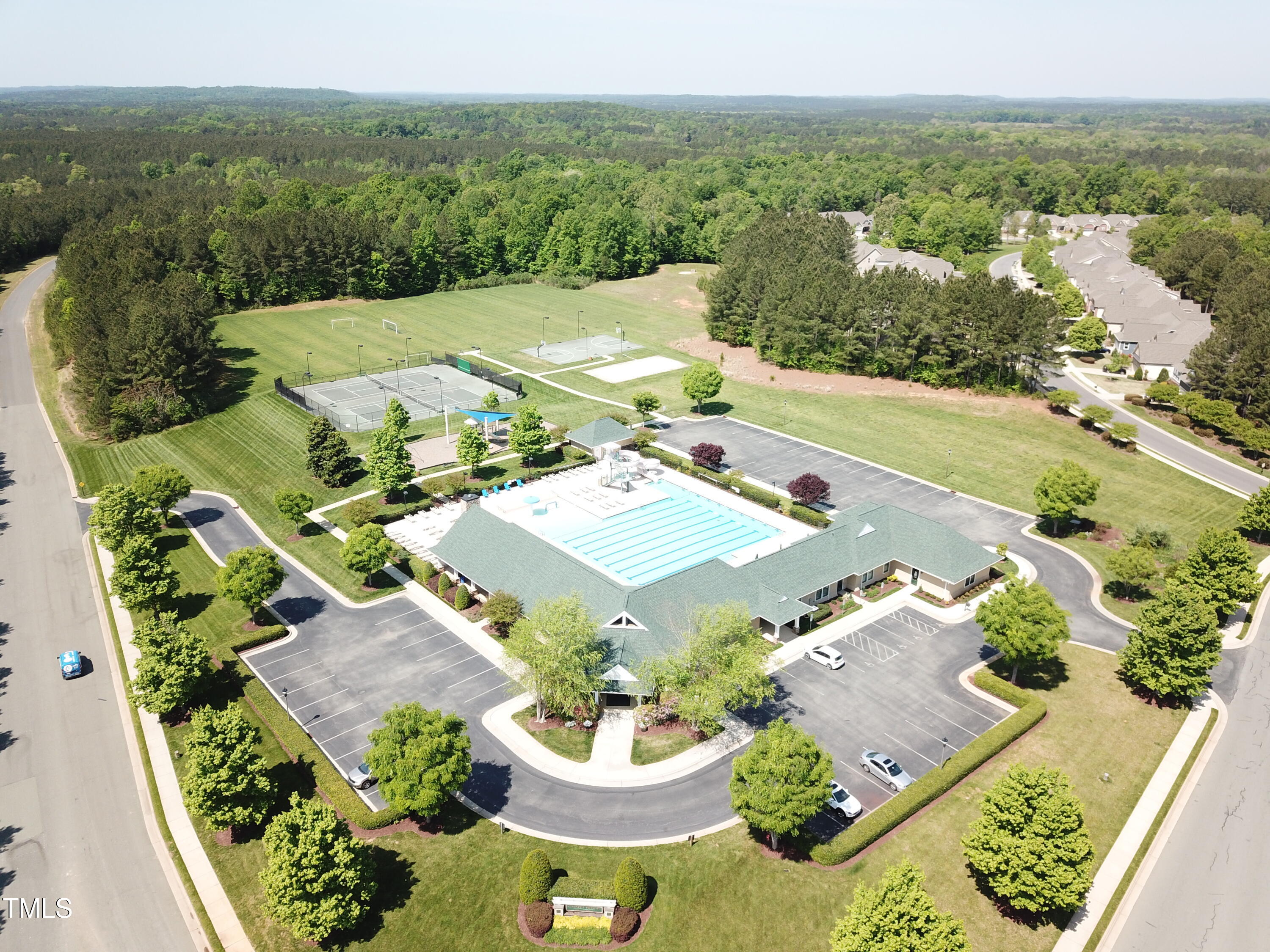 297 Colonial Ridge Drive Pittsboro, NC 27312 - Photo 9 of 28 an aerial view of a house with yard