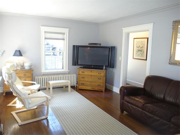 7 Loring Road Weston, MA 02493 - Photo 5 of 20 a living room with furniture and a flat screen tv