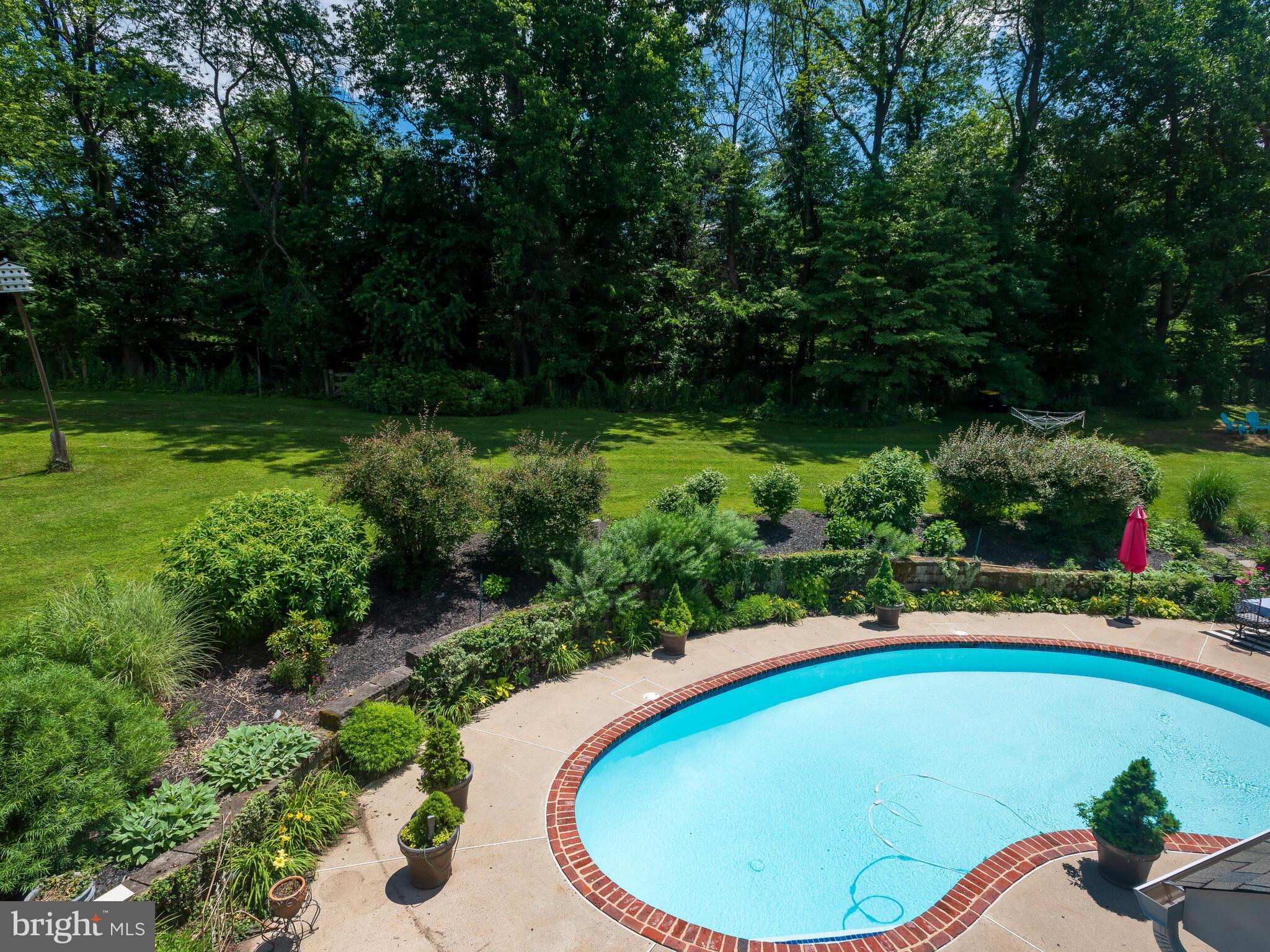 2 Matthews Run Road Chester Springs, PA 19425 - Photo 47 of 55 Expansive yard beyond pool offers privacy