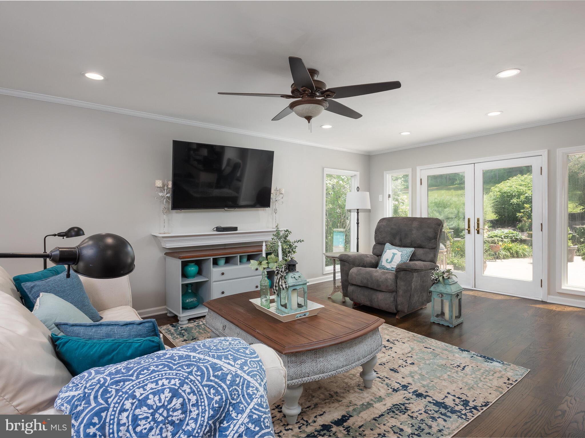 2 Matthews Run Road Chester Springs, PA 19425 - Photo 6 of 55 Spacious family room with french doors to pool