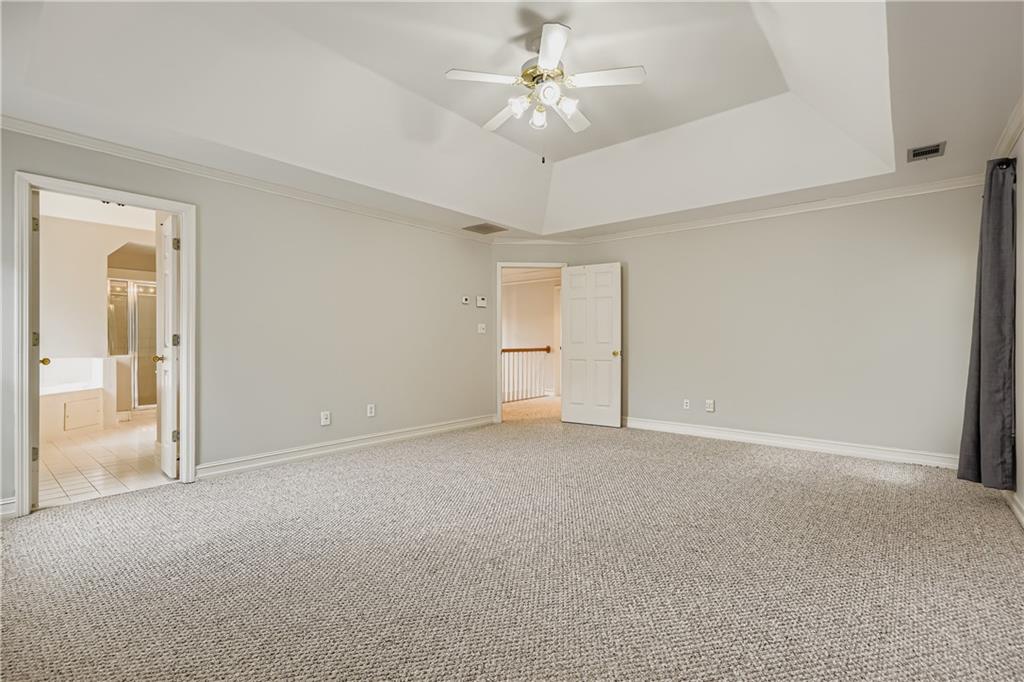 1581 Oak Park Cove Decatur, GA 30033 - Photo 16 of 32 a view of an empty room with a window