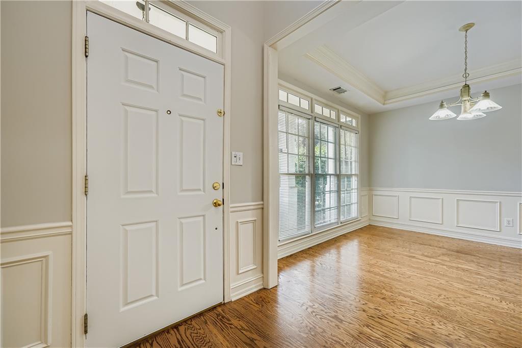 1581 Oak Park Cove Decatur, GA 30033 - Photo 5 of 32 a view of livingroom with hardwood floor and window