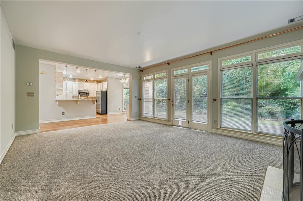 1581 Oak Park Cove Decatur, GA 30033 - Photo 7 of 32 a view of an empty room with a window
