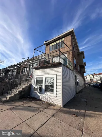 a view of a house with a large space
