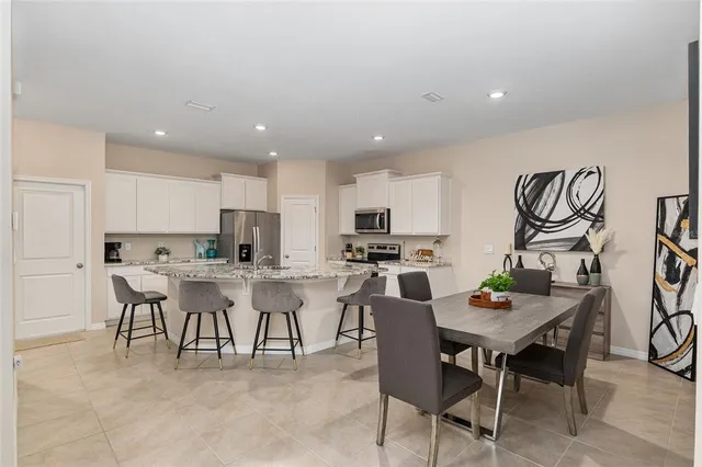a view of a dining room with furniture