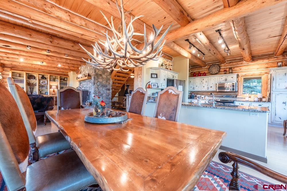 1851 Sioux Road Gunnison, CO 81230 - Photo 11 of 35 Dining Room with Beautiful Elk Antler Chandelier