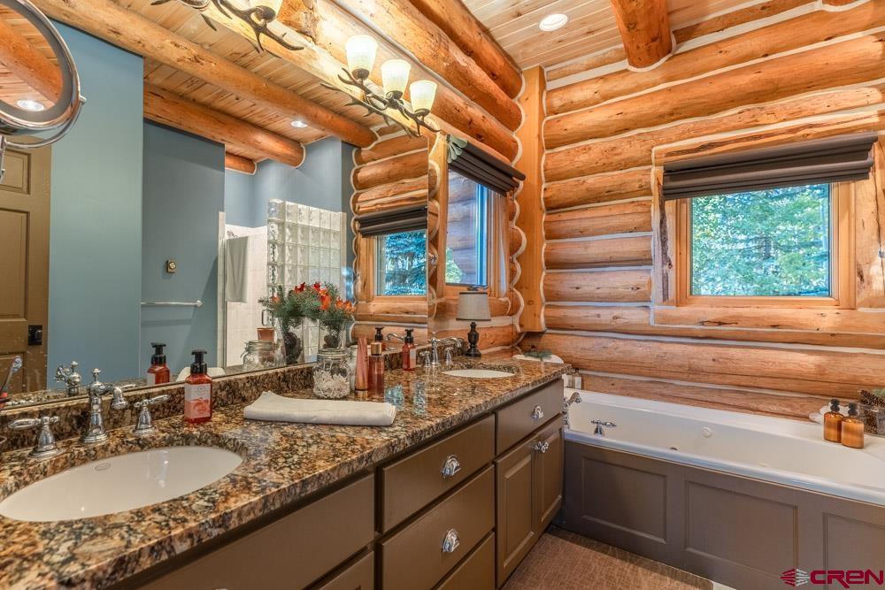 1851 Sioux Road Gunnison, CO 81230 - Photo 15 of 35 Master Bath with Jacuzzi Tub & Shower