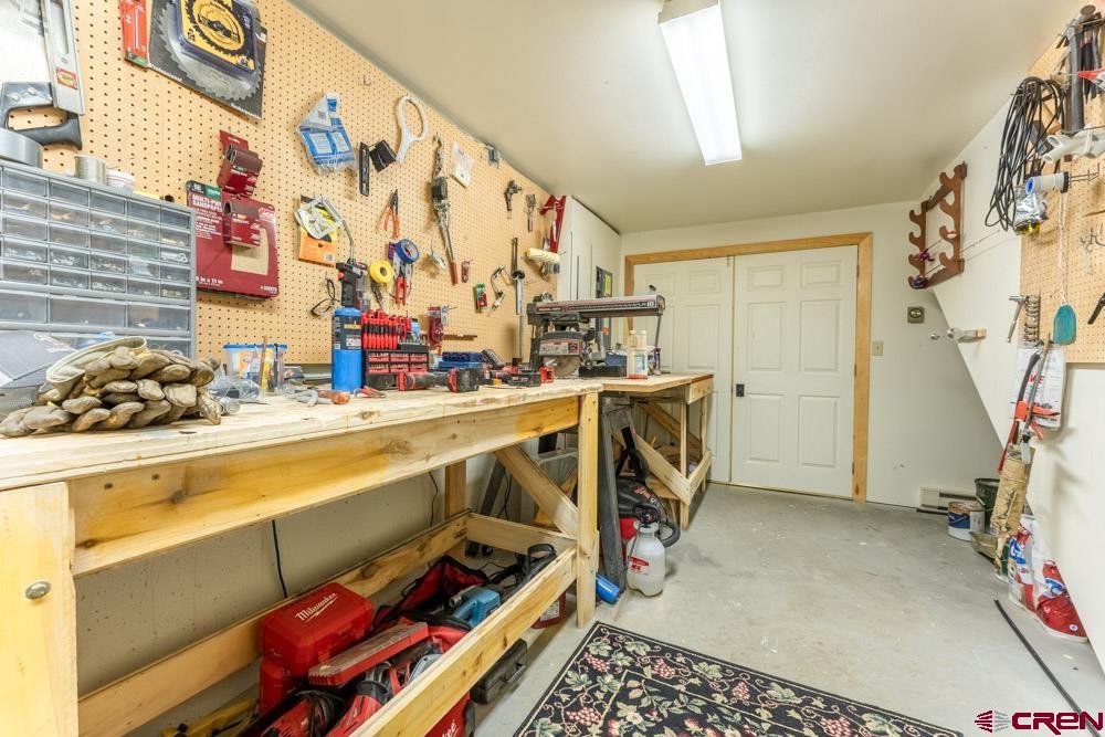 1851 Sioux Road Gunnison, CO 81230 - Photo 24 of 35 Workroom off of the lower level & 2-car garage